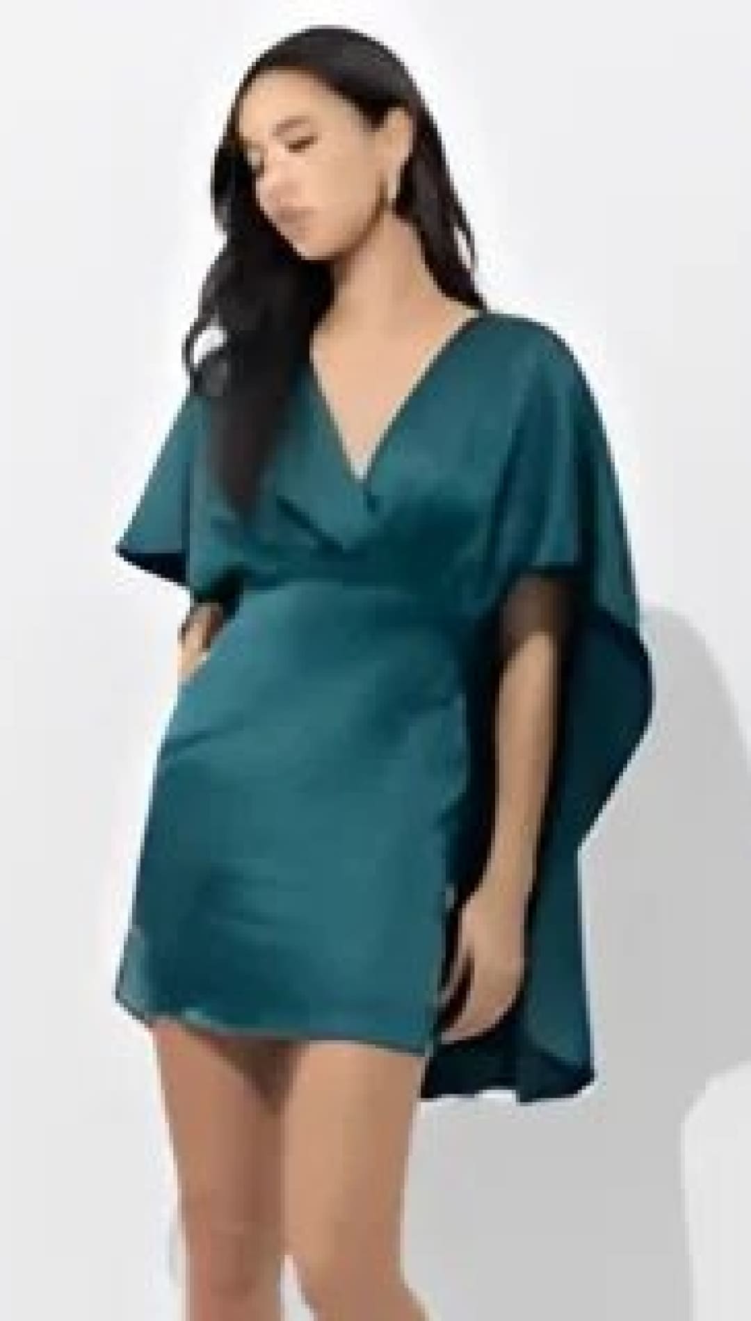 Teal silk wrap dress with kimono sleeves and a deep v-neckline.