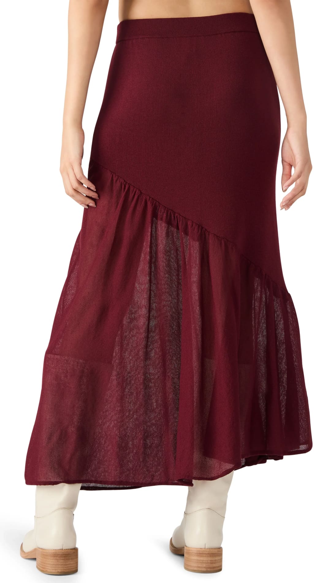 Women’s maroon maxi skirt with a sheer, ruffled, asymmetrical hem.