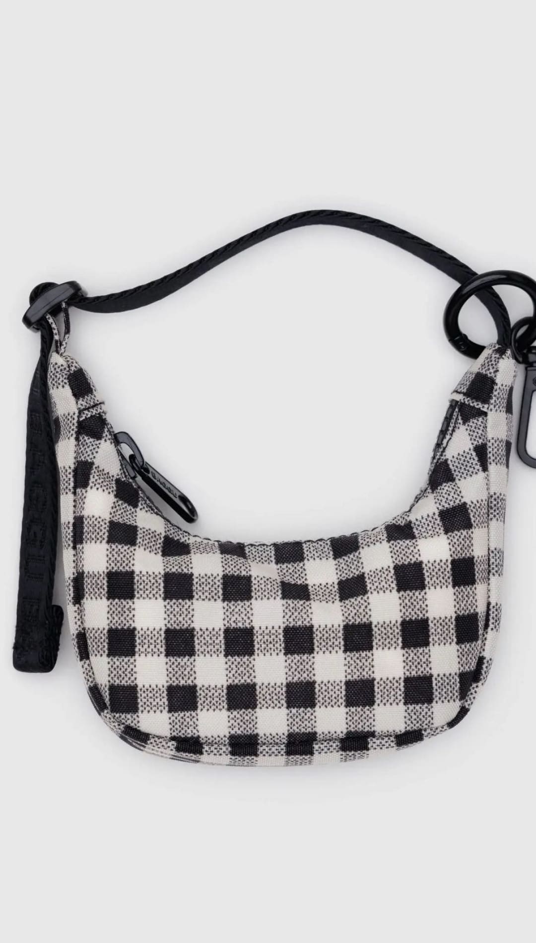Black and white checkered shoulder bag.