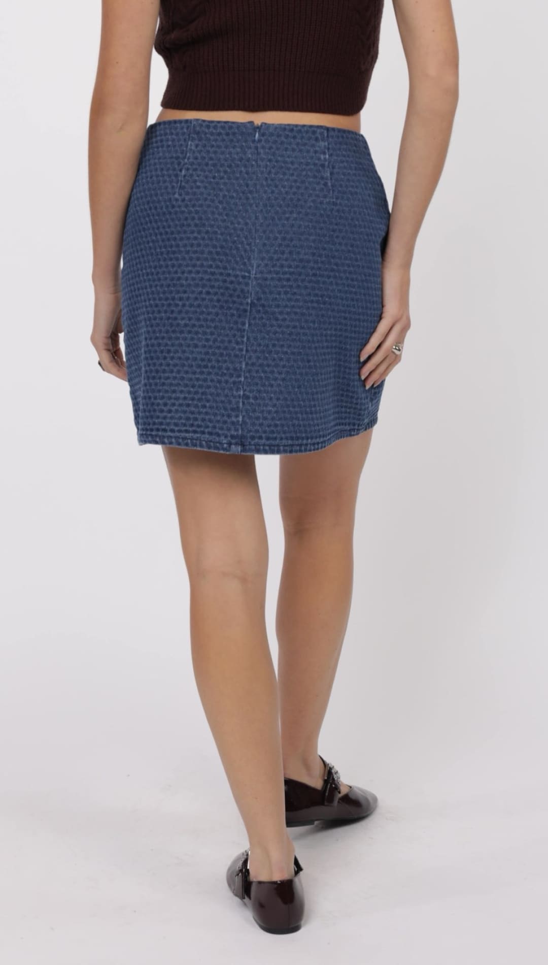 Blue denim mini skirt.