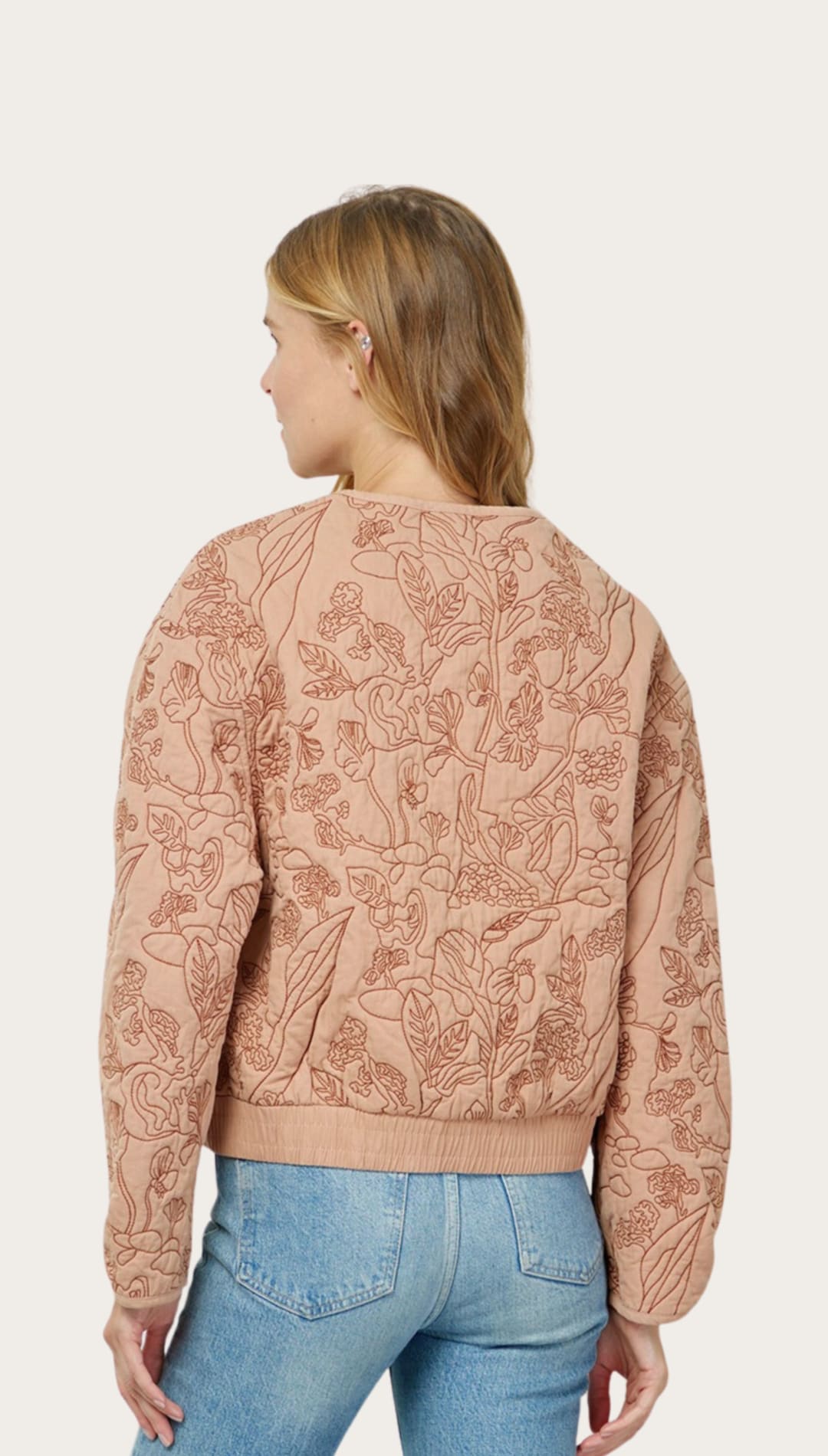Floral-embroidered bomber jacket.