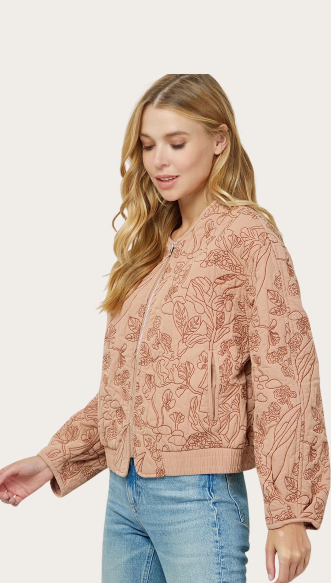 Floral-patterned bomber jacket.