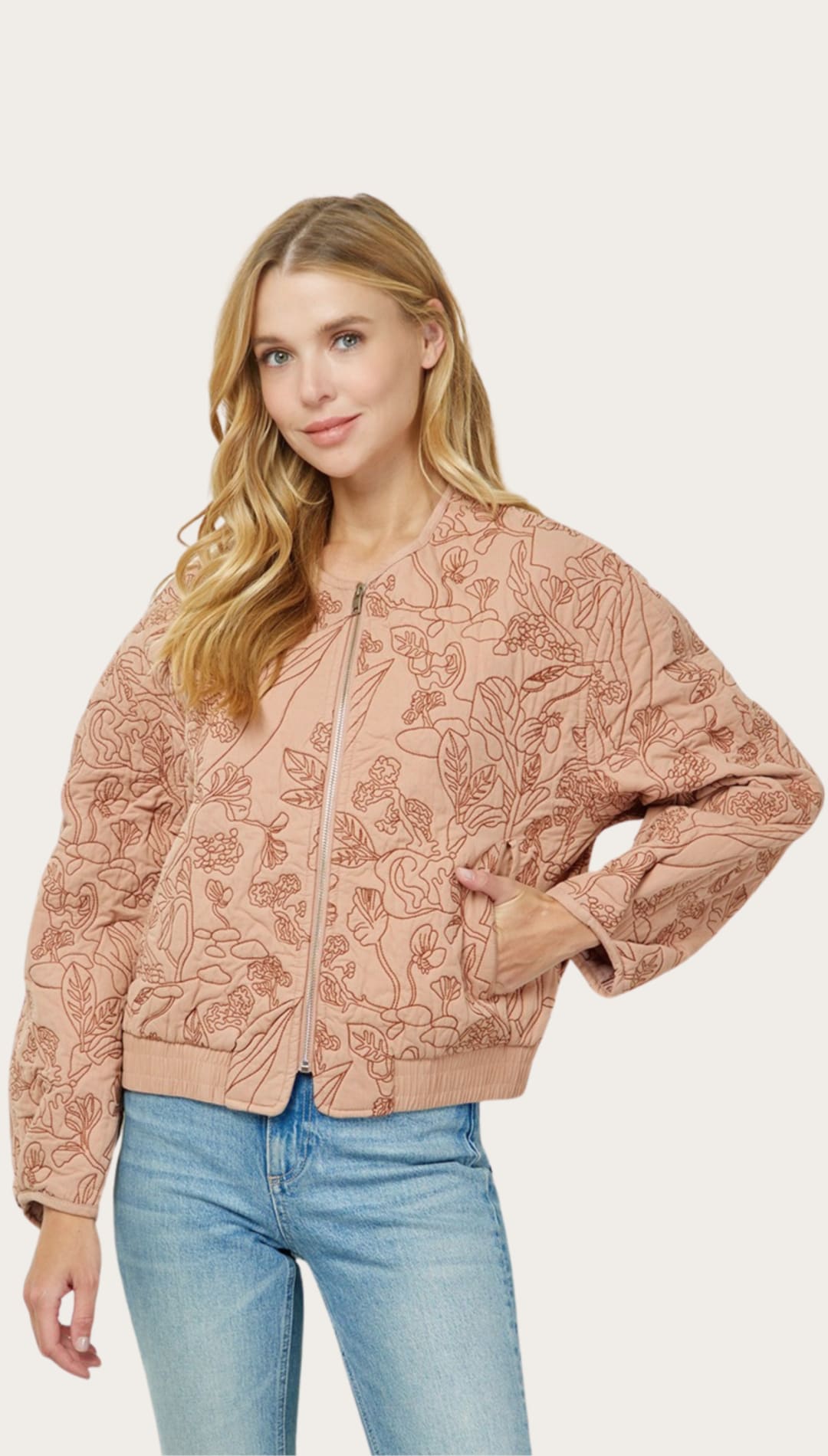 Floral-patterned bomber jacket.