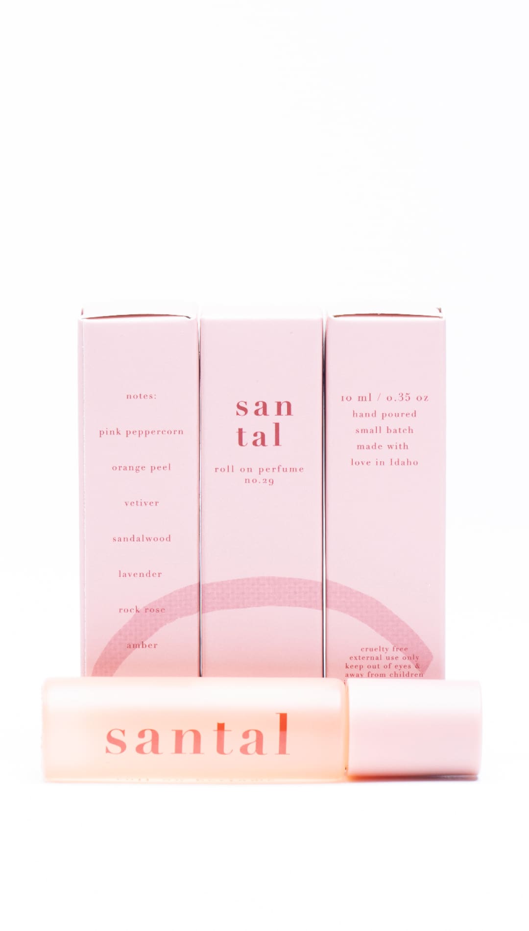 Santal soap bar with pink and white packaging, floral scent notes.