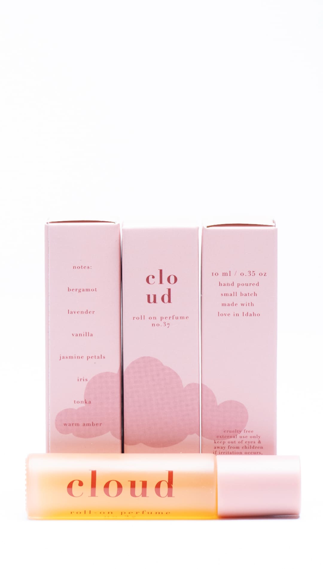 Cloud lip balm in peach and yellow packaging with a minimalist design.