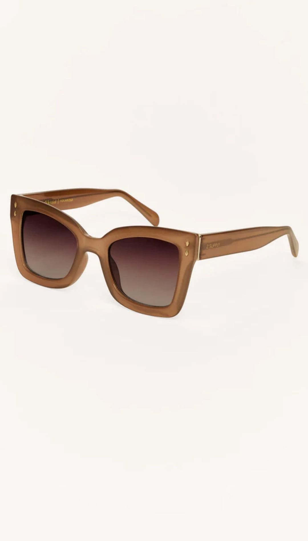 Brown-framed sunglasses with gradient lenses.