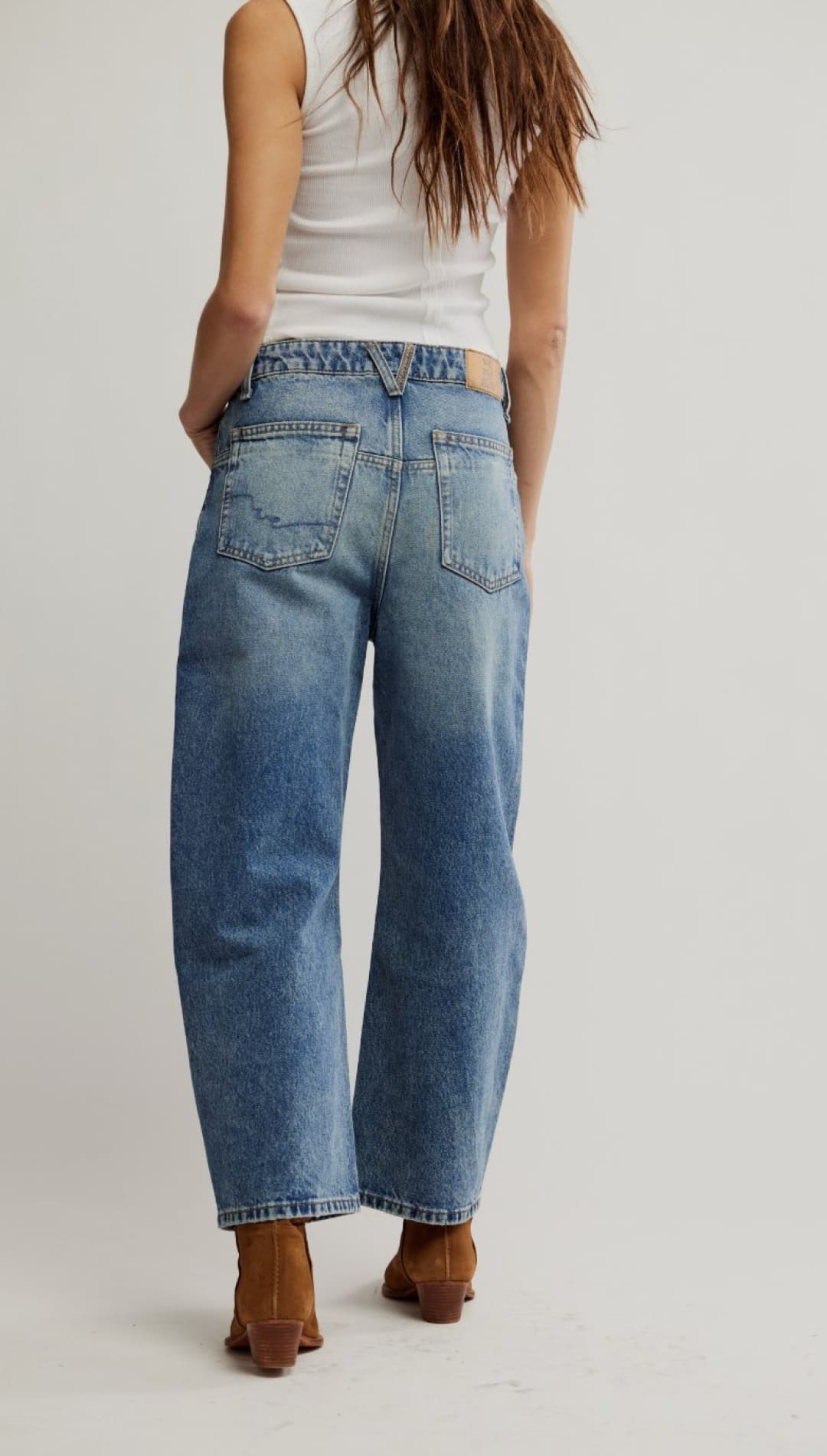 Loose-fitting, light-wash jeans.