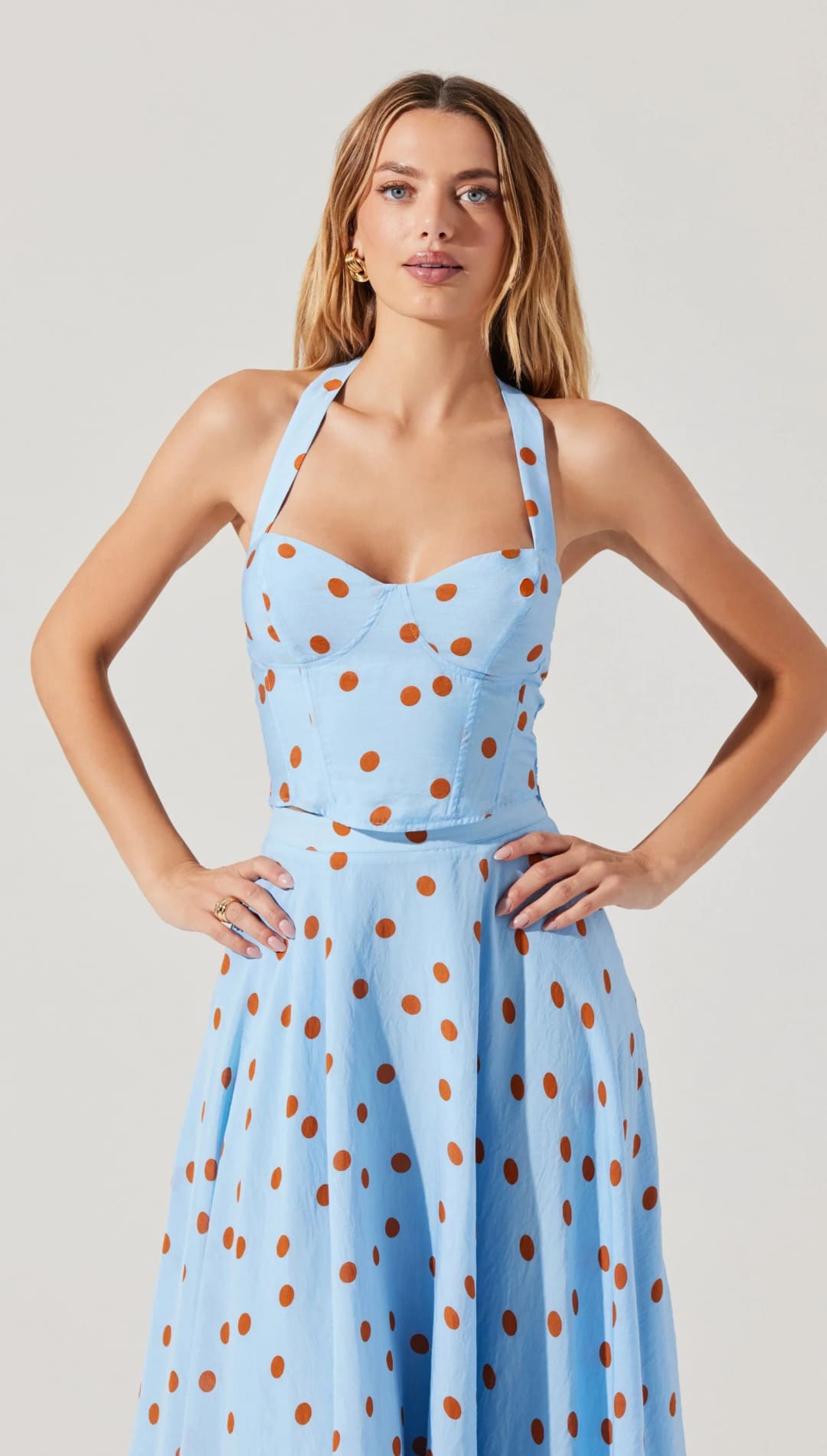 Light blue polka dot halter dress.