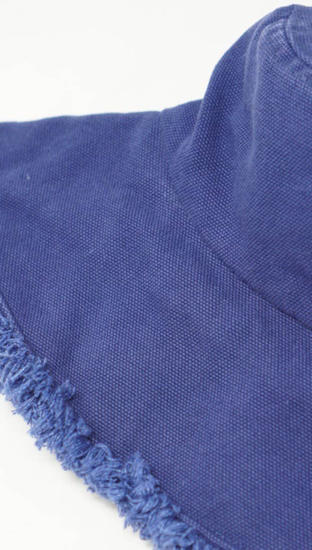 Blue fringed bucket hat.