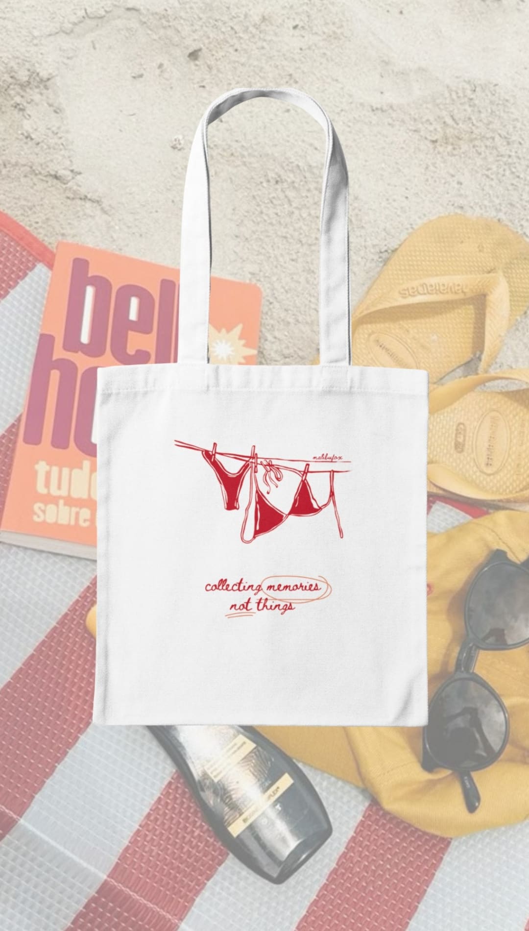 White tote bag with red bikini print.