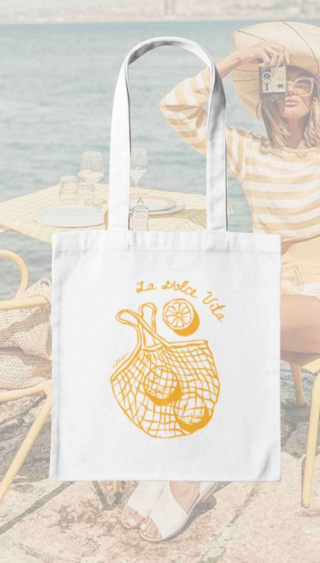 White tote bag with yellow lemon design.