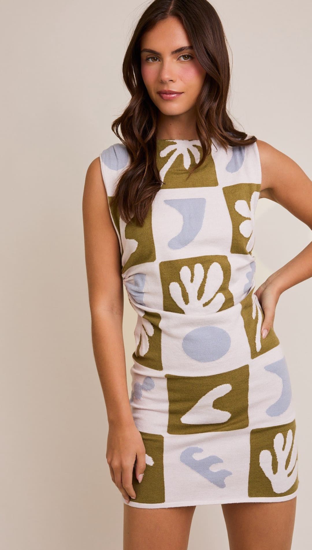 Patterned sleeveless mini dress.