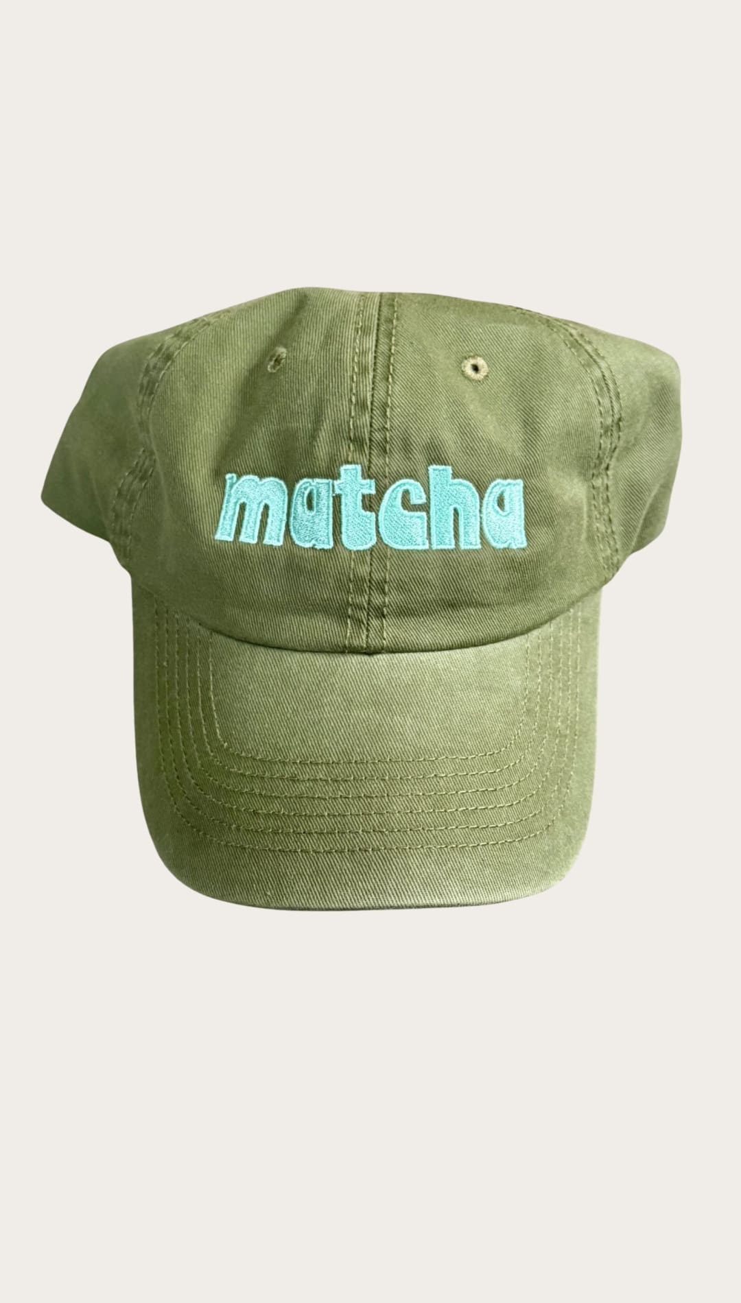 Olive green ’matcha’ baseball cap.