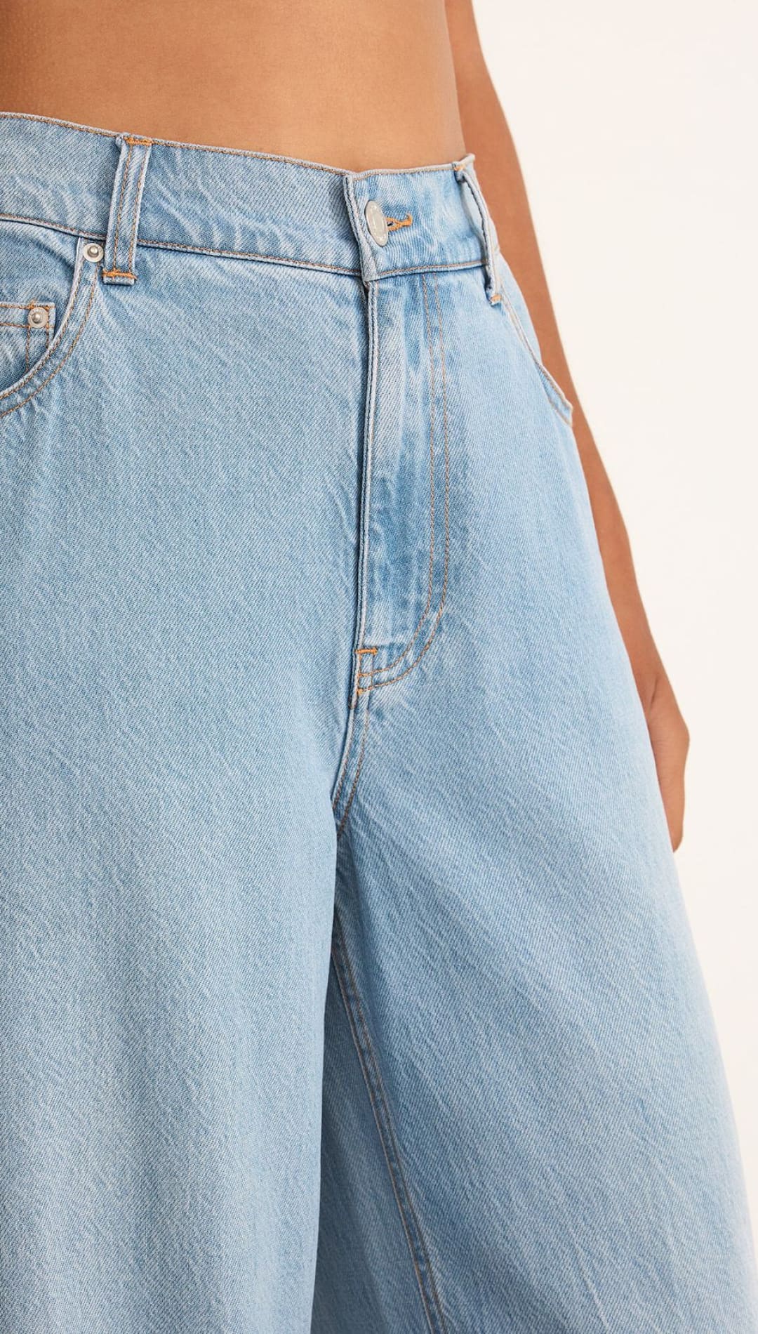 Light blue denim pants.