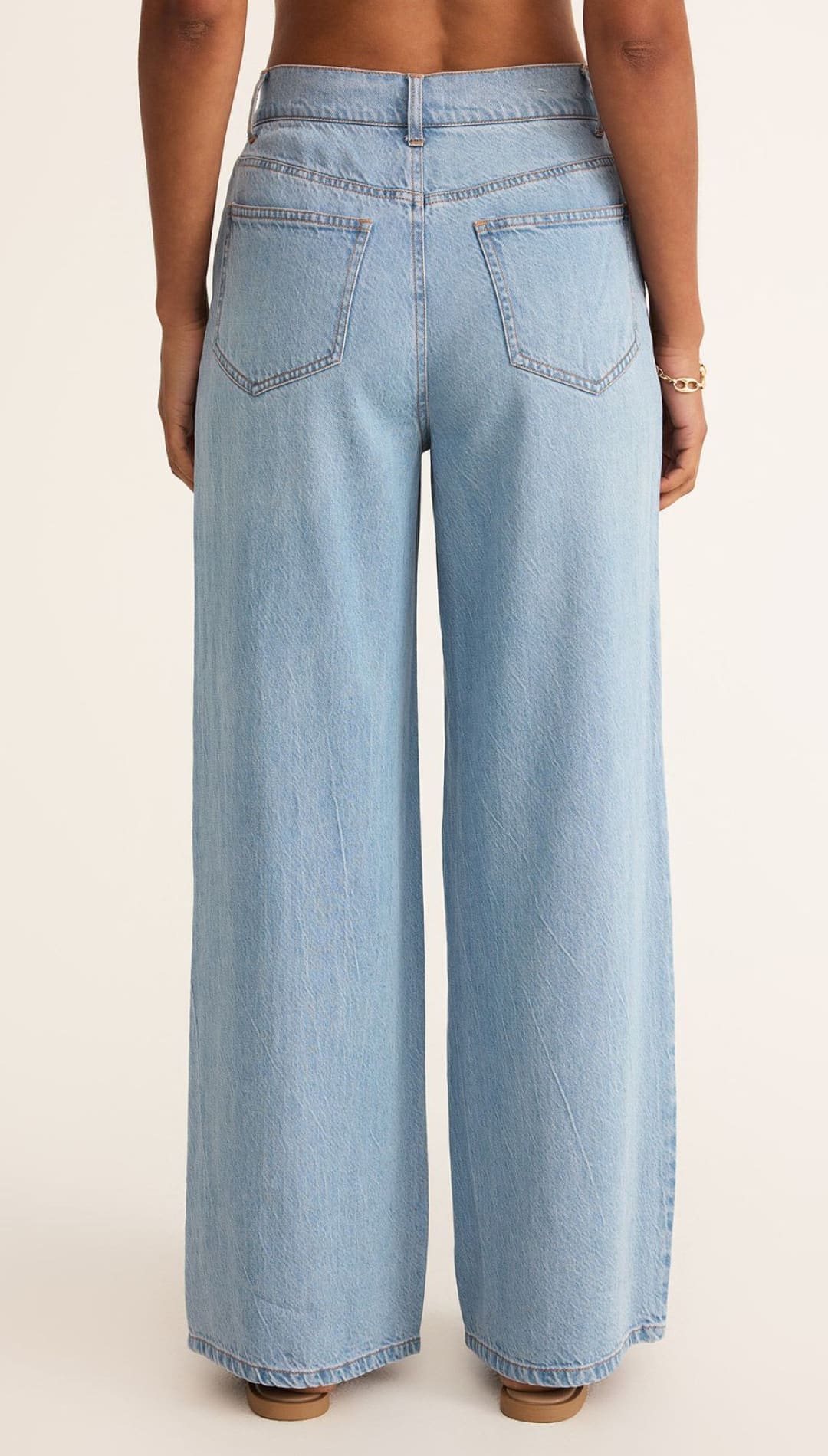 Light blue wide-leg jeans.