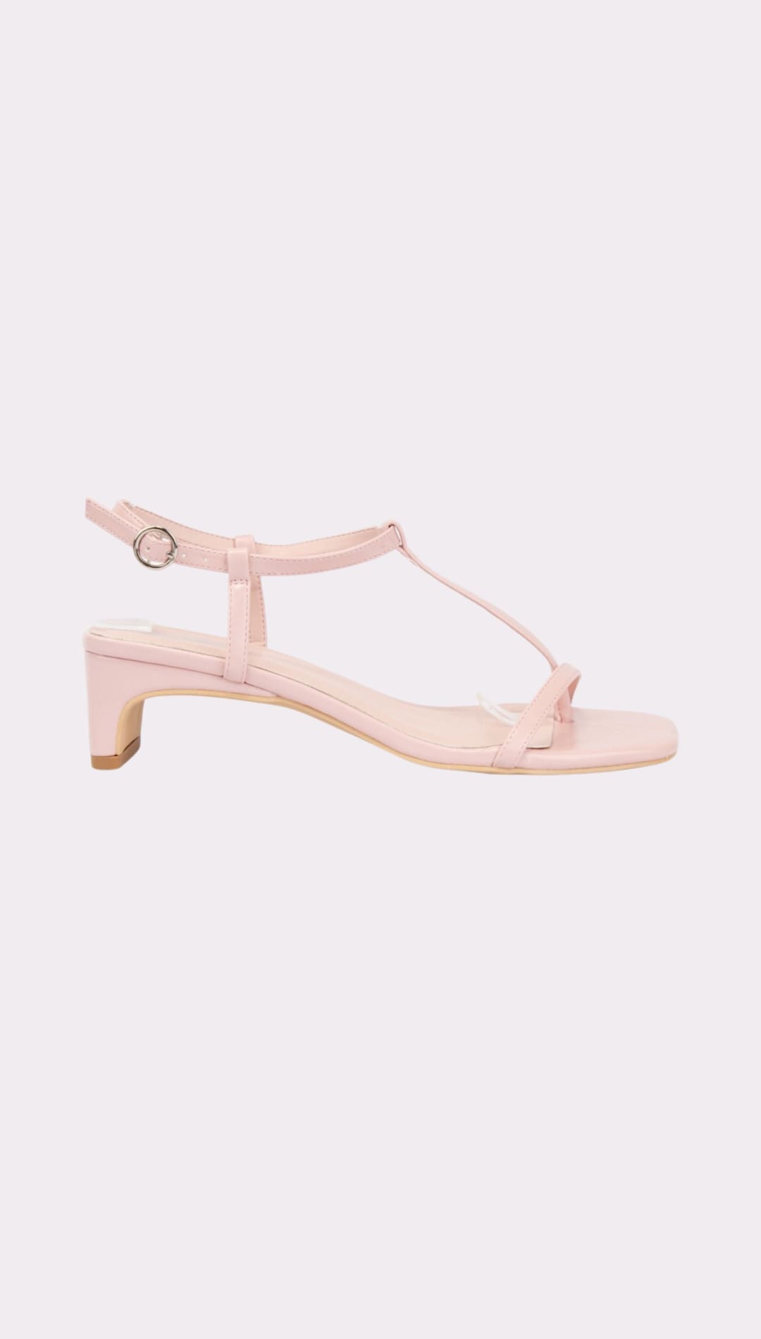 Pink T-strap heeled sandal.