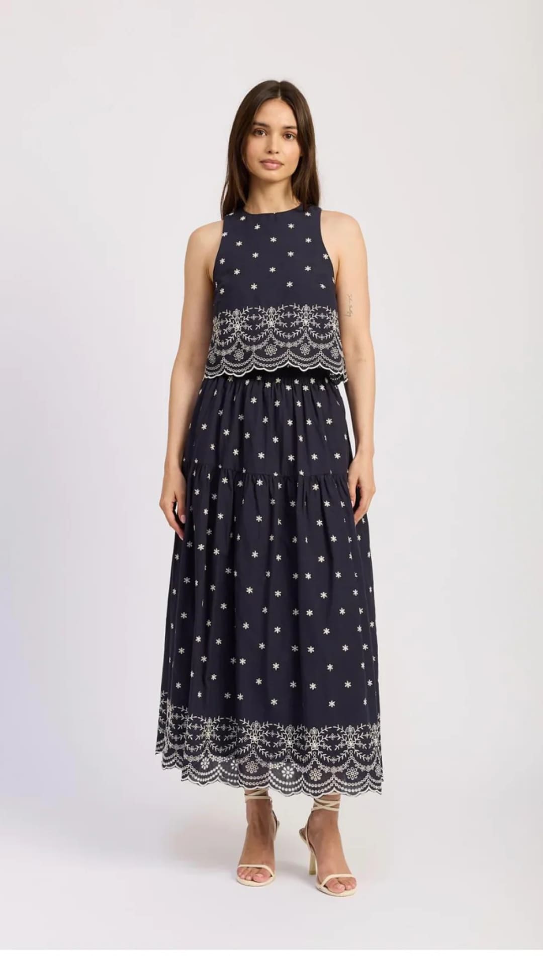 Navy blue polka dot two-piece dress.