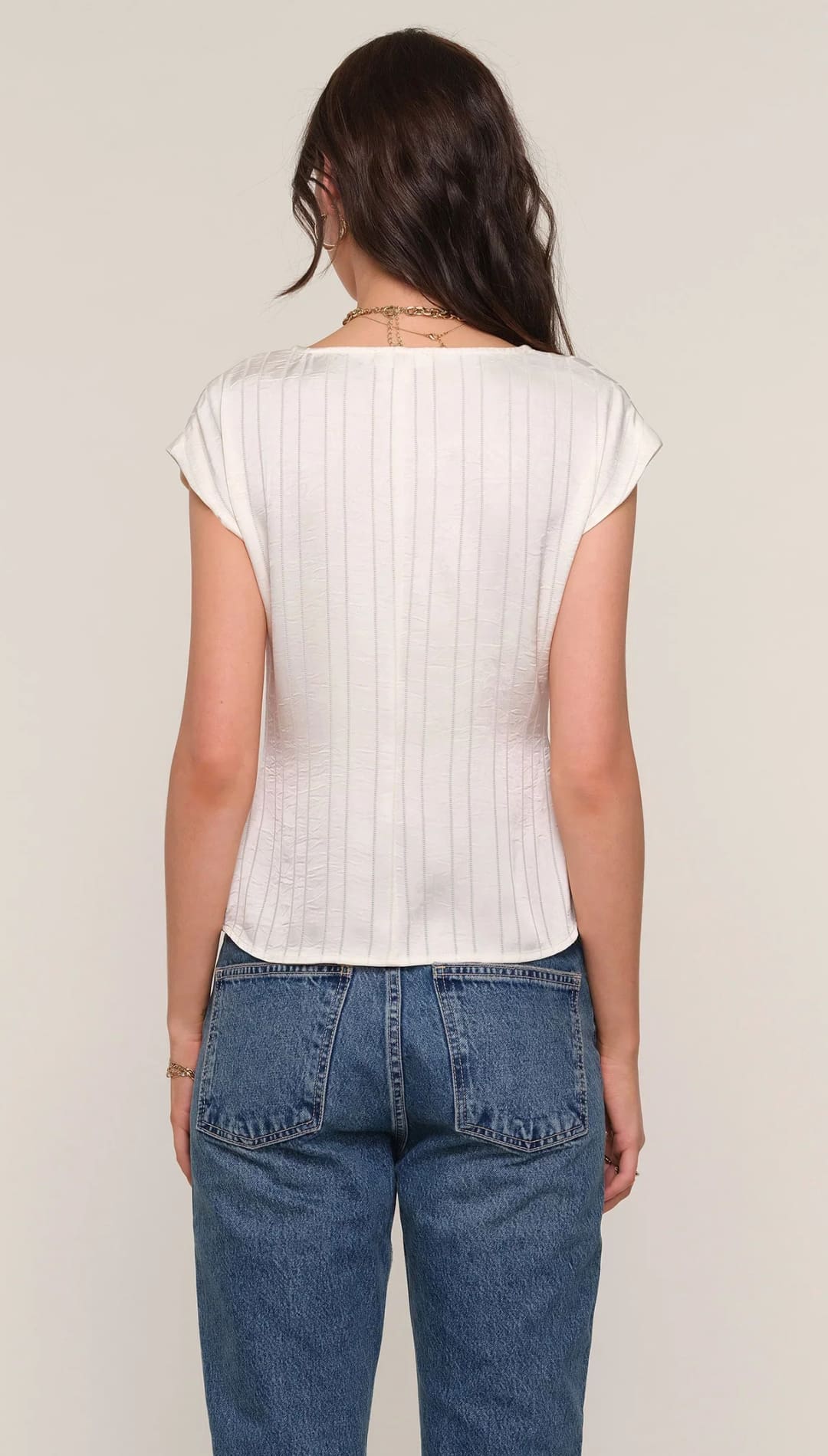 Women’s off-white ribbed short-sleeve top.
