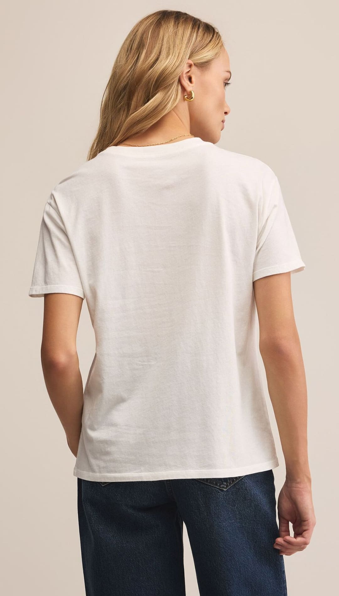 White short-sleeved t-shirt.