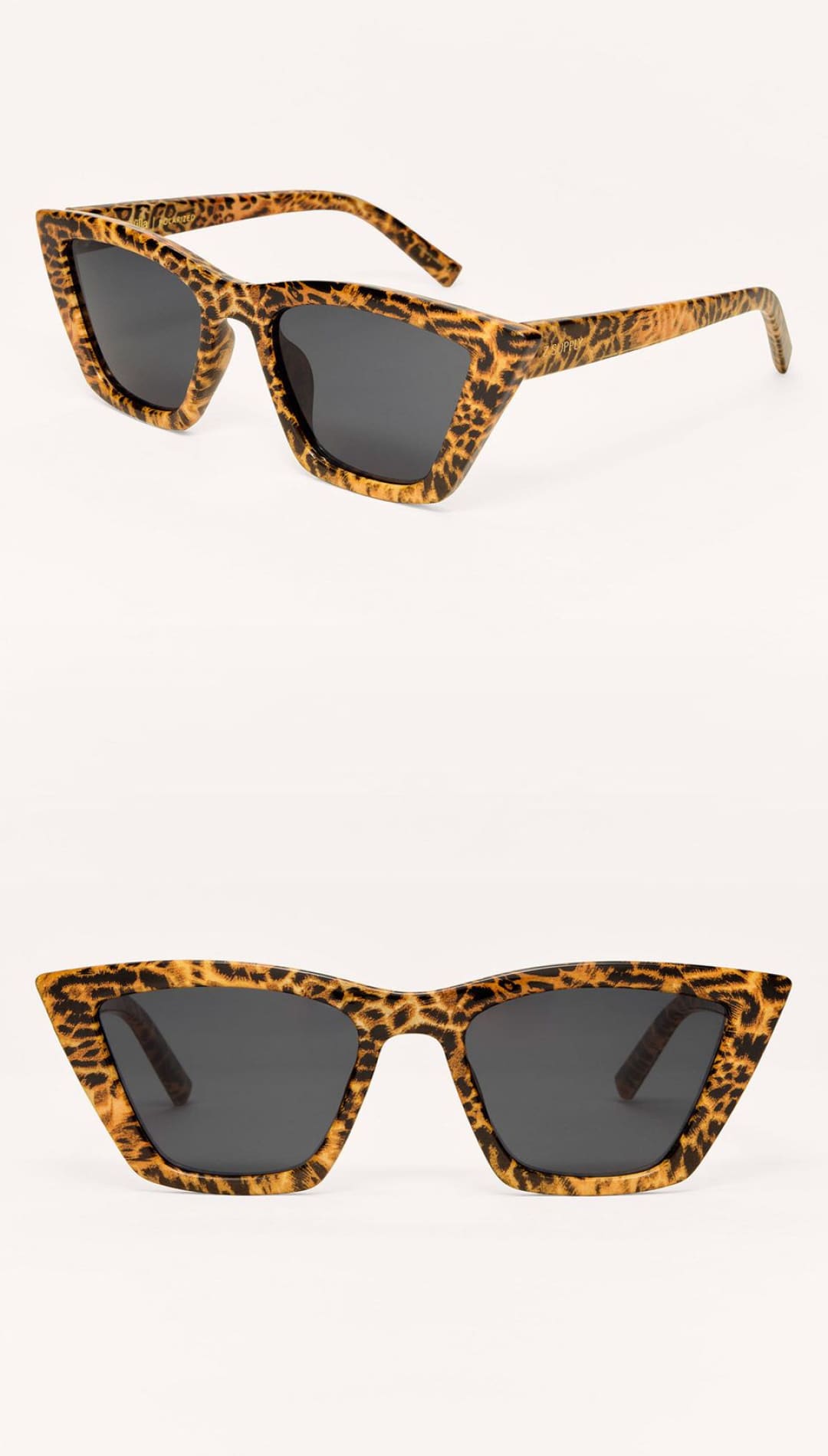 Leopard print cat-eye sunglasses with dark lenses.