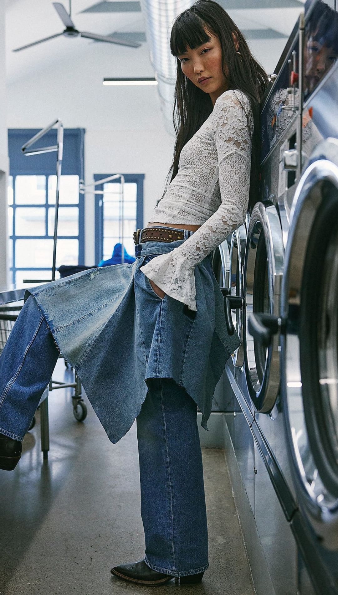 Woman in denim skirt and jeans.