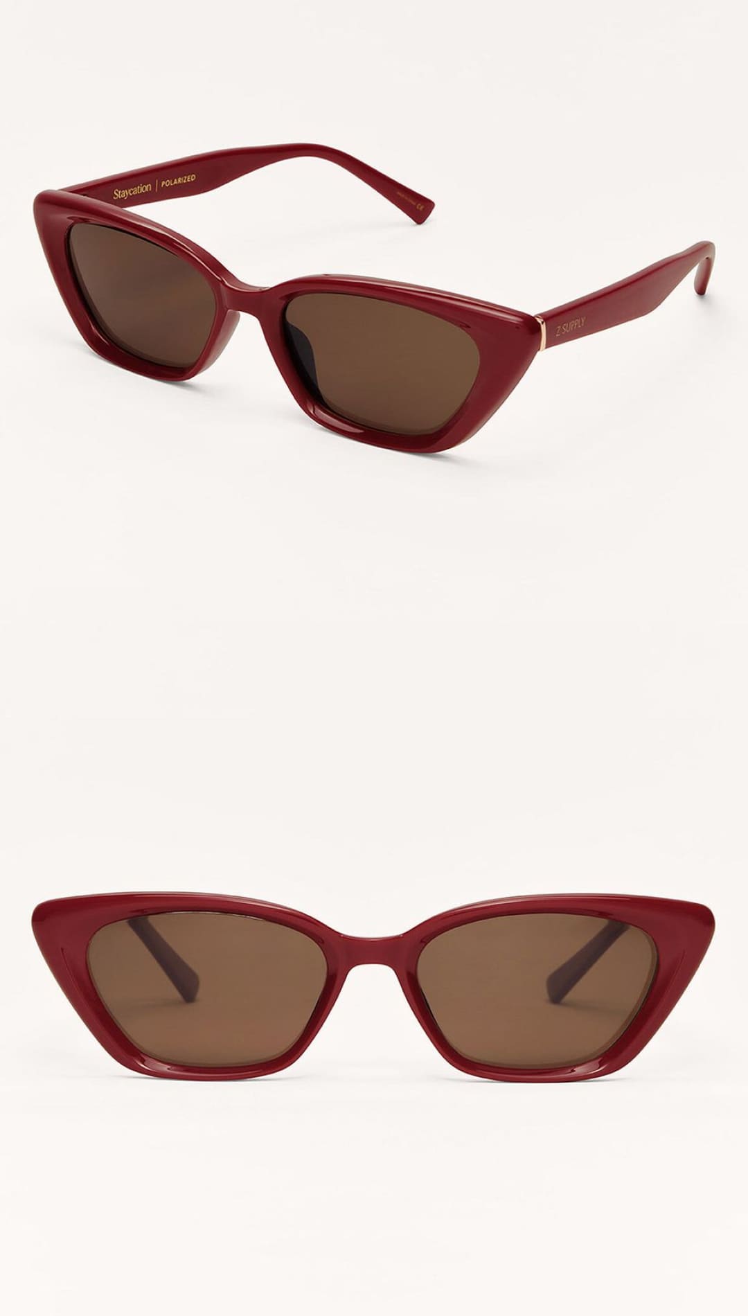 Red cat-eye sunglasses with brown lenses.