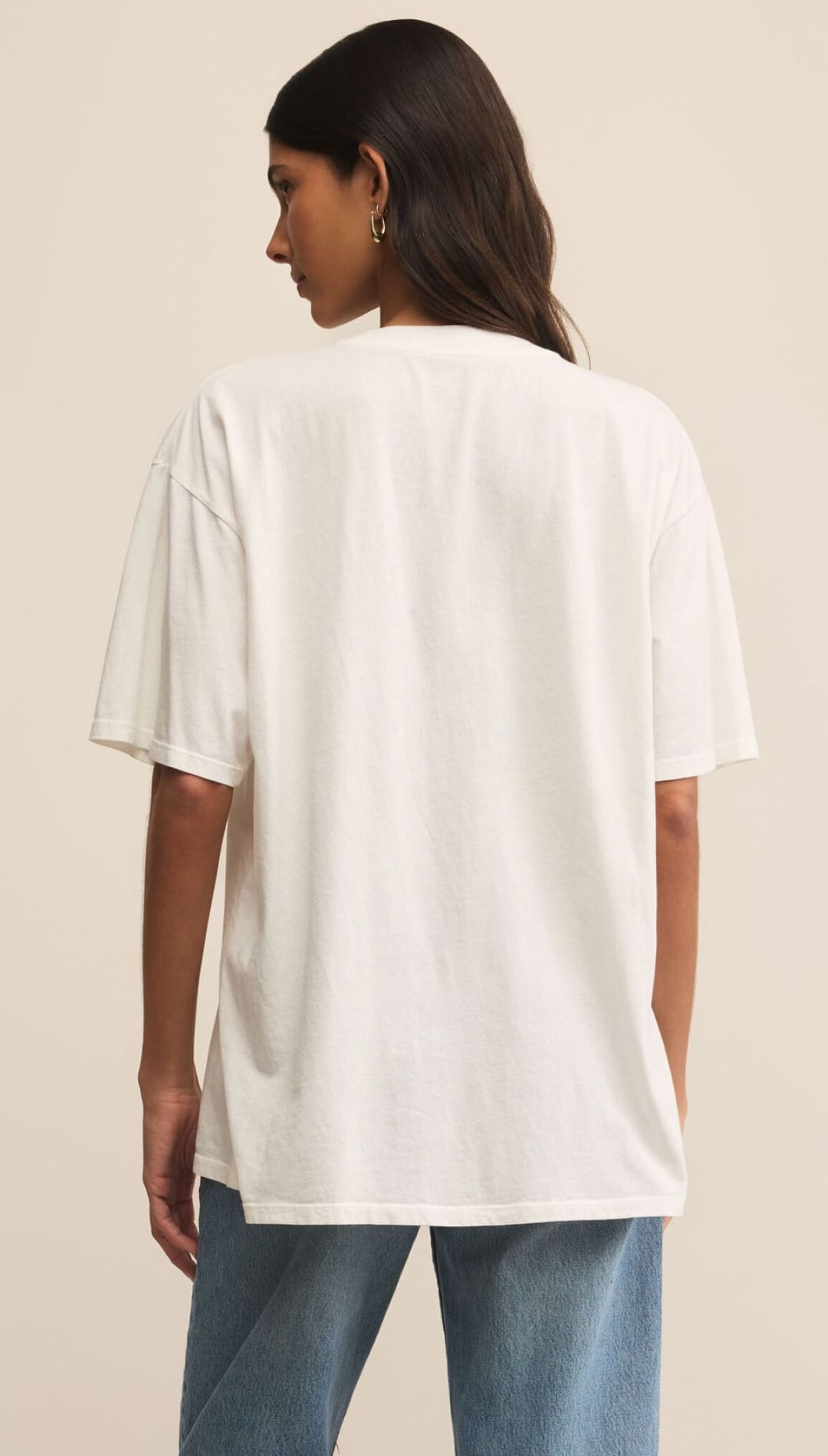 A woman’s oversized white t-shirt.