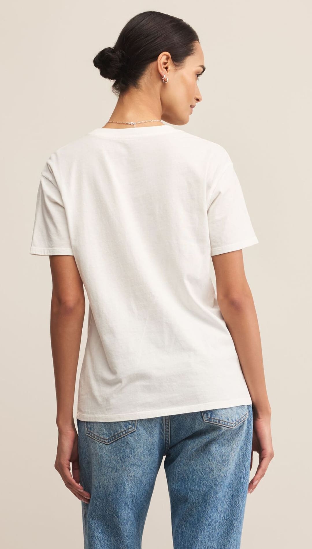 White organic cotton t-shirt with a relaxed fit and crew neck.