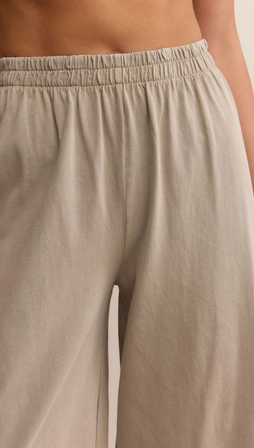 Light beige elastic waist wide-leg pants.